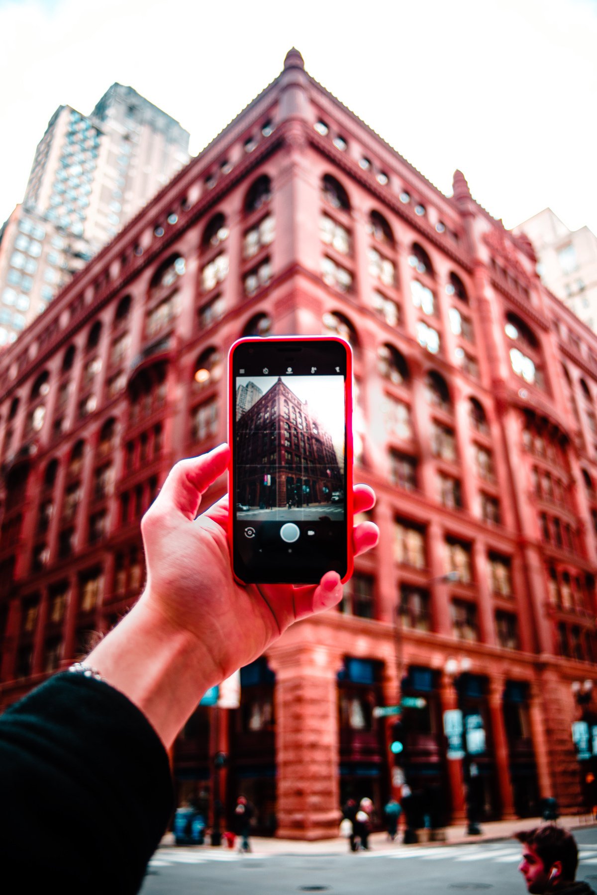 Person Taking Picture of the Building